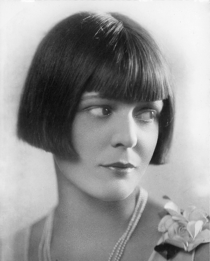 Headshot of young model wearing bob cut